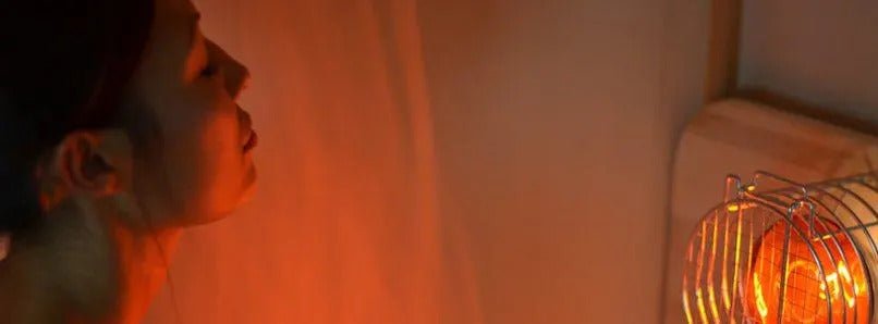 woman in SaunaSpace FireLight sauna sweating and relaxing