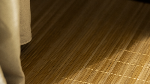 Close-up of Bamboo Grounding Mat that is floor of FireLight Infrared Sauna