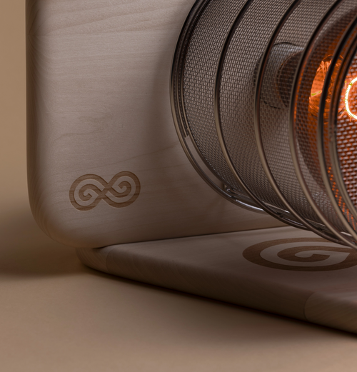 Close-up of SaunaSpace Glow Infrared Therapy Light showing laser engraving of logo