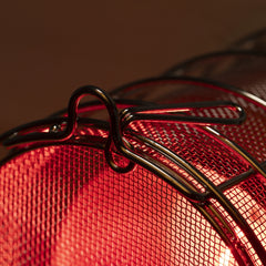 SaunaSpace Hearth Quartet Infrared Therapy Sauna Panel - close up of bulb guards with lights on