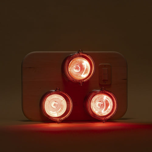 SaunaSpace Hearth Trio Infrared Therapy Sauna Panel - standing on floor with dark lighting