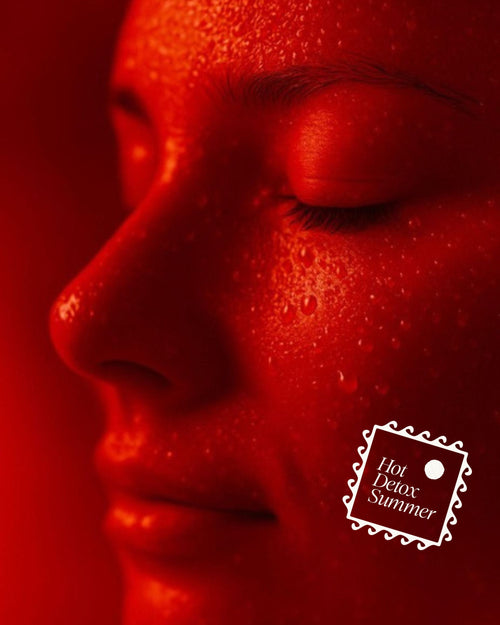 Young woman’s face, glistening with sweat under intense red sauna light, eyes are closed in calm focus, capturing the heat, intensity, and ritual power of deep sweating and cellular renewal.