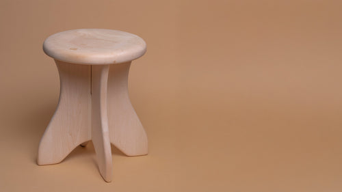 SaunaSpace basswood Sauna Stool on a beige background