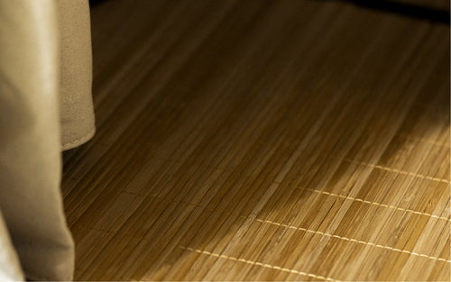 Close-up of Bamboo Grounding Mat inside FireLight Infrared Sauna with sauna curtain in foreground