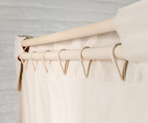 SaunaSpace FireLight Sauna Enclosure Kit - close-up of curtain and curtain rod with covers removed