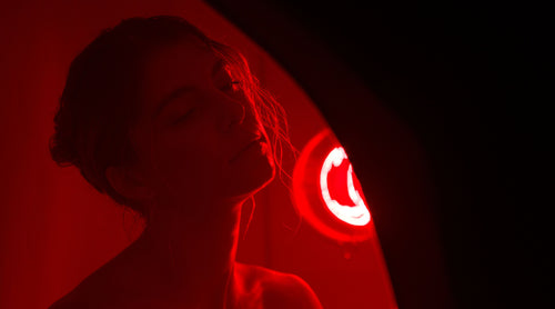 Silhouette of a woman in the FireLight Infrared Sauna.