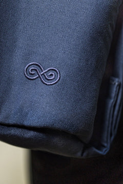 SaunaSpace Travel Soft Case for Glow Infrared Therapy Light - Indigo - close-up of embroidery
