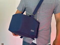 SaunaSpace Travel Soft Case for Glow Infrared Therapy Light - Indigo - man holding case