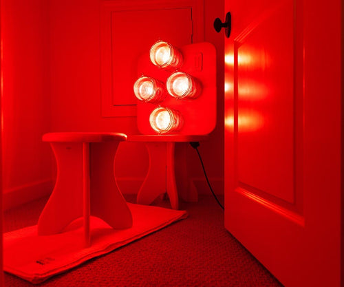 SaunaSpace Hearth Pedestal in closet with Hearth Quartet Infrared Therapy Sauna Panel and Sauna Stool - DYI closet sauna