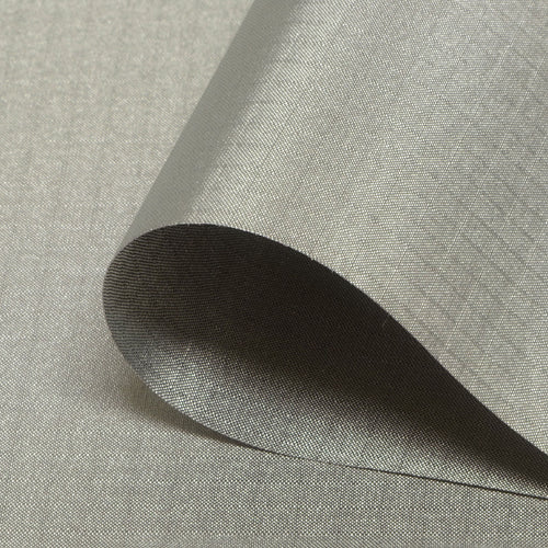 A close-up of Shielded Healing's SubShield - 40ft tube, showing silver-grey polyester fabric with a subtle sheen, partially folded.
