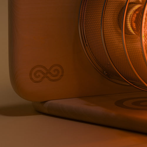 SaunaSpace Glow Infrared Therapy Light - close up of laser engraving